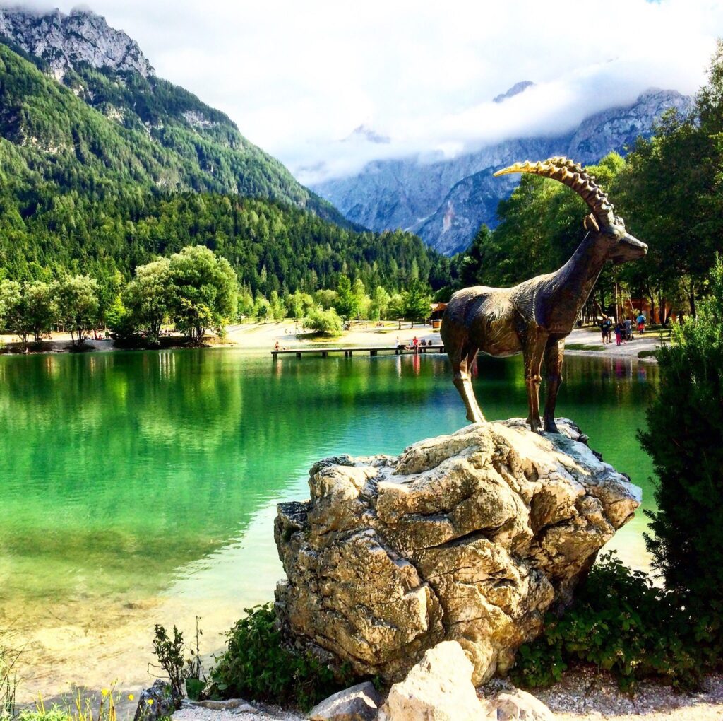 Lake Jasna near Kranjska Gora with alpine peaks behind